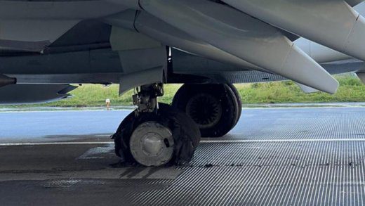 The damaged landing gear on the American Airlines Aircraft at Argyle International Airport on Monday, Jan. 20, 2024.