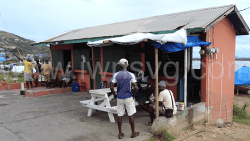 People interact in Union Island on Dec. 30, 2024