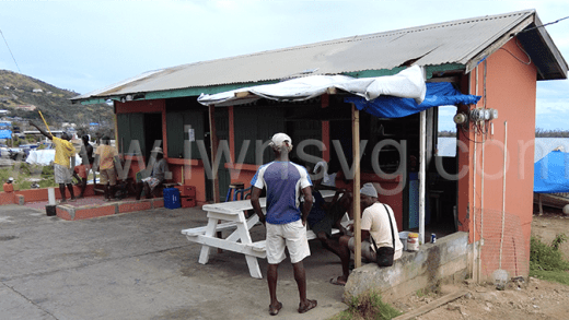 People interact in Union Island on Dec. 30, 2024
