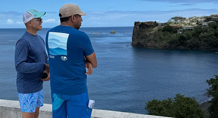 Terence Des Vignes, regional project director of Sandals Resorts International, left, and Minister of Finance Camillo Gonsalves in a photo that appears to show them at the construction site for Black Sands Resort. (Photo: Facebook/ Camillo MIchael Gonsalves)
