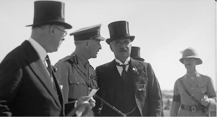 Lord William Peel, right, and Sir Horace Rumbold, left, leave the British War Cemetery on Mount Scopus in Jerusalem in 1936 as part of their work on the Peel Commission. (Image source: Library of Congress)