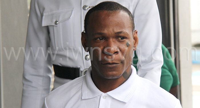 Rosano Theobalds is escorted to prison on Friday, Feb. 28, 2025, to serve his sentence for abduction and physical assault.