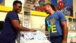 Dr. Akousa Horne-Cupid, a paediatrician at the Milton Cato Memorial Hospital, left, demonstrates the correct usage of the new infant warmer to Ike Abbott, a Sandals Foundation Ambassador and team member at Sandals Saint Vincent & the Grenadines.