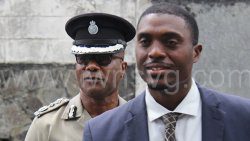 Deputy Commissioner of Police Frankie Joseph, left, and prosecutor acting Sergeant of Police Shamrack Pierre outside the Kingstown Magistrate's Court on Monday, Feb. 24, 2025. 