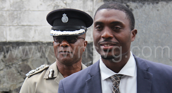 Deputy Commissioner of Police Frankie Joseph, left, and prosecutor acting Sergeant of Police Shamrack Pierre outside the Kingstown Magistrate's Court on Monday, Feb. 24, 2025. 