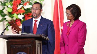 Stuart Young, left, takes the relevant oath as he is sworn in on Monday as prime minister of Trinidad and Tobago, as and President Christine Kangaloo looks on. (Photo: Facebook/OPMTT)