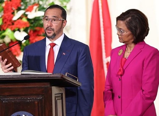 Stuart Young, left, takes the relevant oath as he is sworn in on Monday as prime minister of Trinidad and Tobago, as and President Christine Kangaloo looks on. (Photo: Facebook/OPMTT)