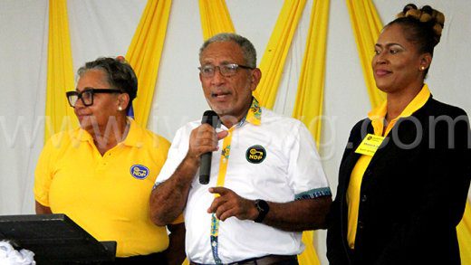 Opposition Leader and New Democratic Party President, Godwin Friday, centre, and Lavern Gibson-Velox, left, and Senator Shevern John, the party’s two female candidates in the next general elections at the Elect Her conference in Kingstown on Saturday, March 8, 2025 – International Women’s Day. 