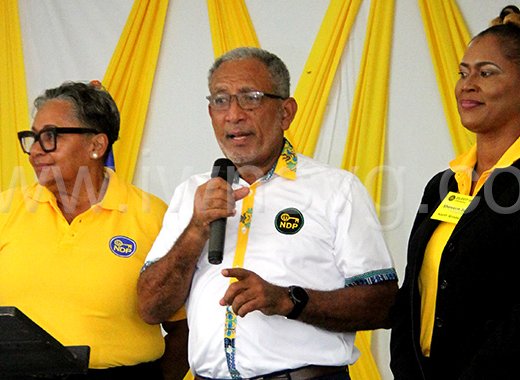 Opposition Leader and New Democratic Party President, Godwin Friday, centre, and Lavern Gibson-Velox, left, and Senator Shevern John, the party’s two female candidates in the next general elections at the Elect Her conference in Kingstown on Saturday, March 8, 2025 – International Women’s Day. 