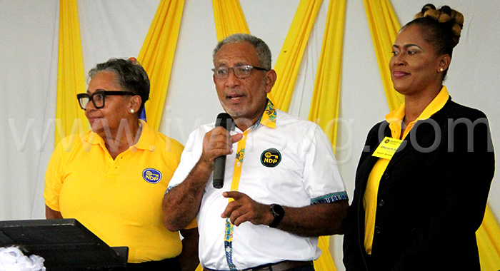 Opposition Leader and New Democratic Party President, Godwin Friday, centre, and Lavern Gibson-Velox, left, and Senator Shevern John, the party’s two female candidates in the next general elections at the Elect Her conference in Kingstown on Saturday, March 8, 2025 – International Women’s Day. 
