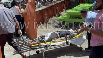 Ambulance workers take an injured Michael Richards aka Boxer, from the scene where he was shot in Kingstown on April 1, 2025. He died in hospital on Thursday, April 17, 2025.