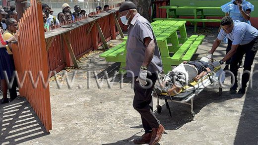 Ambulance workers take the injured man from the scene for transportation to hospital on Tuesday, April 1, 2025. 
