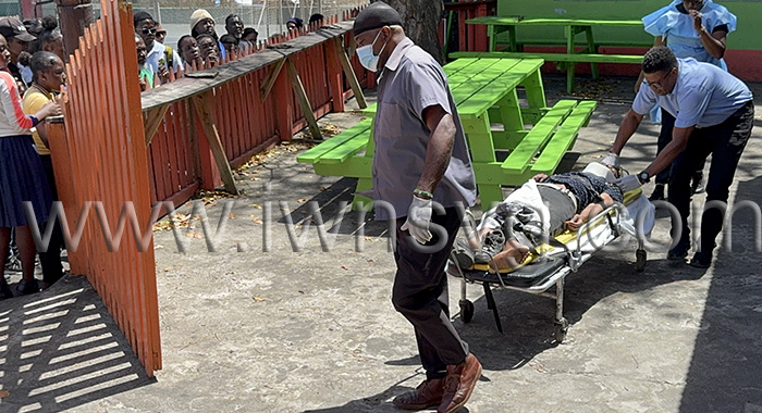 Ambulance workers take the injured man from the scene for transportation to hospital on Tuesday, April 1, 2025. 

