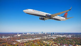 boeing 737 10 in flight over atlanta