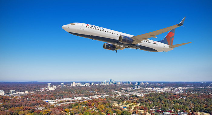 boeing 737 10 in flight over atlanta