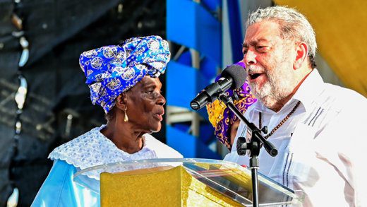 Prime Minister Ralph Gonsalves, left, and a Spiritual Baptist cleric at the worship service at Victoria Park, Kingstown on Wednesday, May 21, 2025. (Photo: Facebook/APISVG)