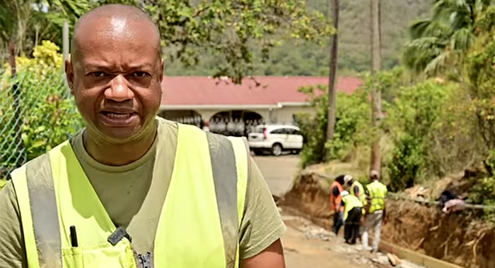 Attorney General Grenville Williams speaking to state media in April 2024 about public works project in South Leeward.
