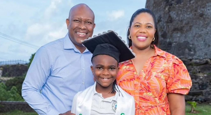 The 2025 top performer in the Caribbean Primary Exit Assessment, Saj Christophe Caesar, centre, and his parents, Minister of Agriculture, Saboto Caesar, left, and his wife, Dr. Reisha Twana Browne-Caesar. (Photo: Facebook/saboto.s.caesar)