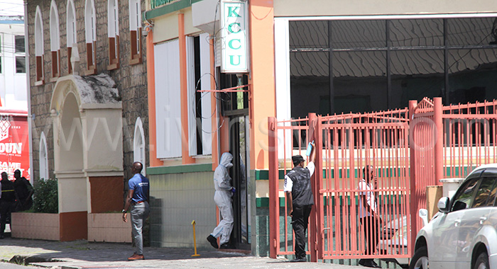 Police process the scene of the shooting death at KCCU headquarters on Granby Street, Kingstown, on Wednesday, July 10, 2025.