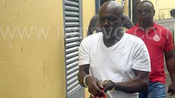 Murder accused, Wadie Simon, a security guard employed by Guardsman SVG Ltd., arrives at the Serious Offences Court on Friday, July 11, 2025.
