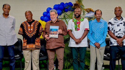From left: Historians Adrian Fraser and Michael Dennie, Prime Minister Ralph Gonsalves and Minister of Culture Carlos James, and historians Arnold Thomas and Cleve Scott. (Photo: Facebook/APISVG)