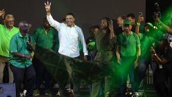 Prime Minister Andrew Holness and supporters of his Jamaica Labour Party celebrate their victory in the general election on Monday, Sept. 1. 2025.