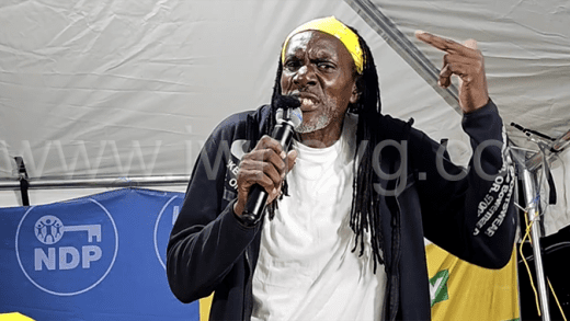Aster John aka Ras John campaigning with the opposition New Democratic Party in Town Hill on Sept. 1, 2025.