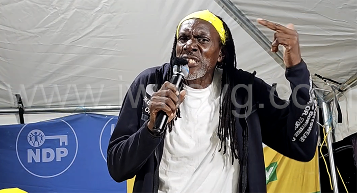 Aster John aka Ras John campaigning with the opposition New Democratic Party in Town Hill on Sept. 1, 2025.