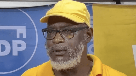 Retired public servant Harvey Farrell, a former executive member of the Public Service Union, who is assistant secretary general of the main opposition New Democratic Party, campaigning with the party in Mahaut.