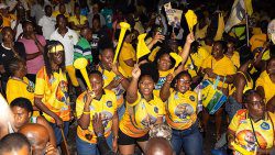 Supporters of the opposition New Democratic Party at the party's East Kingstown office opening in Sion Hill on Saturday, Sept. 27, 2025. 