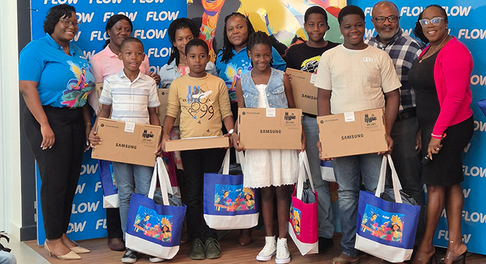 Scholarship recipients with FLOW representatives.