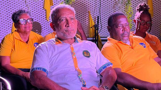 Southern Grenadine MP, Terrance Olliverre, right, Opposition Leader Godwin Friday, centre and New Democratic Party candidate for East St. George, Laverne Gibson Velox, at an NDP Southern Grenadines campaign event.