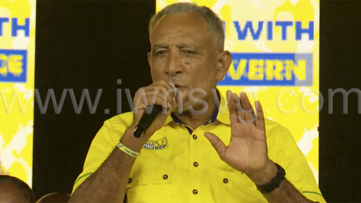 Opposition Leader Godwin Friday speaking at the New Democratic Party's Warm Up Rally in London on Saturday, Oct. 25, 2025.