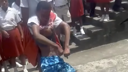 The injured student is assisted after falling unconscious after he was stabbed in the head at North Union Secondary School on Oct. 3, 2025.