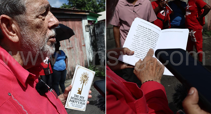 Prime Minister Ralph Gonsalves holds up a copy of the book “New Democratic Party’s Plans for St. Vincent and the Grenadines” in Georgetown on Monday, Nov. 10, 2025. 