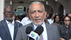 Prime Minister Godwin Friday speaking to the media outside the Administrative Complex in Kingstown on Monday, Dec. 1, 2025. 