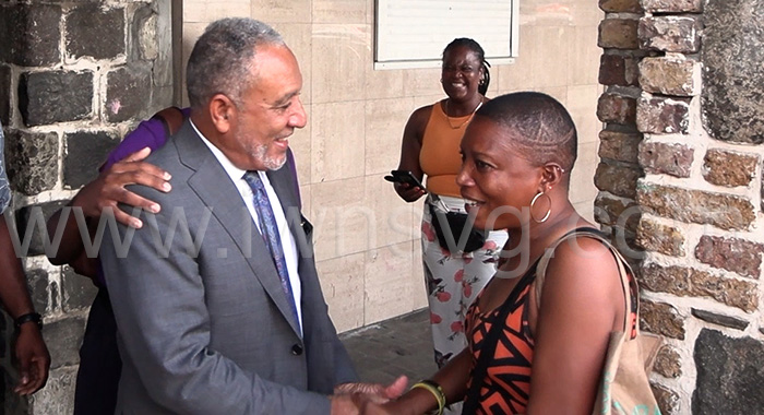 Prime Minister Godwin Friday interacts with people in Kingstown on Friday, Dec. 19, 2025.