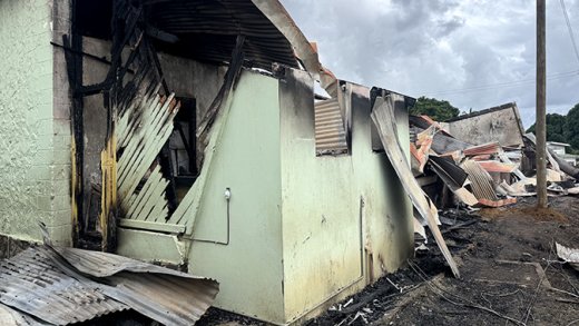 The burnt-out section of the Questelles Government School on Tuesday, Dec. 30, 2025.