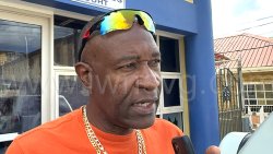 The defendant, Christopher “Too Cool” Jones, speaks to the media outside the Kingstown Magistrate’s Court on Wednesday, Dec. 10, 2025. 