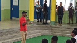A police officer who is involved in the police youth clubs speaks to students at the West St. George Secondary School about resisting gang lifestyle. 