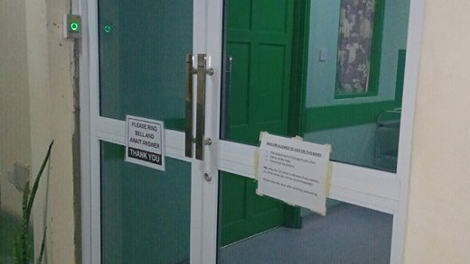 A photo of the newly installed main entrance door, which includes a bell system.