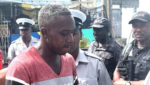 Sebastian Audain, who is charged with possession and trafficking in cocaine that fishermen allegedly found at sea, arrives at the Layou Magistrate's Court on Thursday, Feb. 19, 2026.