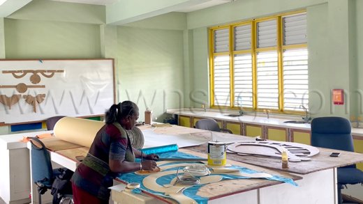 A member of Blondie Bird and Friends works on the mas band’s 2026 presentation on Saturday, March 28, 2026, one week after production began at the Thomas Saunders Secondary School campus in Kingstown.