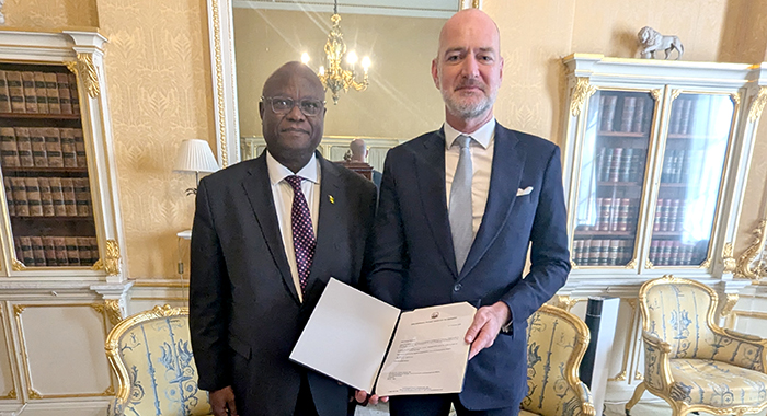 High Commissioner Brereton Horne presents his PM-to-PM letter to Director of Protocol and Vice Marshall of the Diplomatic Corps, Scott Furssedonn-Wood.