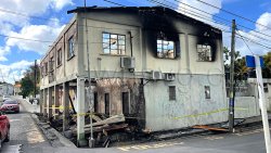 The burnt-out shell of the Calliaqua Police Station on March 14, 2026.