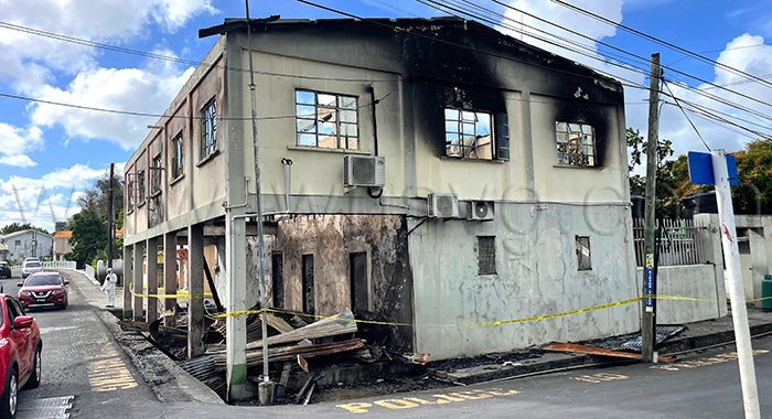 The burnt-out shell of the Calliaqua Police Station on March 14, 2026.