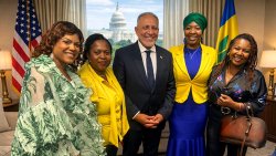 Prime Minister Godwin Friday poses with Vincentians in Washington on Friday, April 17, 2025. (Photo: Facebook/Nell Cyrus.)