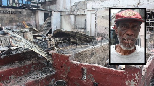 Former national footballer, George “Fatpants” Forbes, inset, and the remains of the house that was destroyed by fire on Thursday night. 