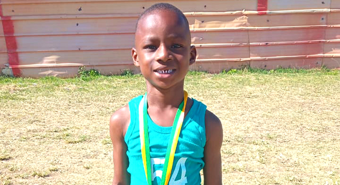Richland Park Seventh-day Adventist Primary School student Mateo Bailey with his with his gold medal.