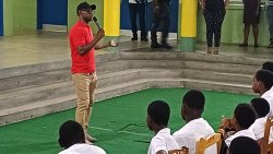 A police officer interacts with students of West St. George Secondary School in February. 